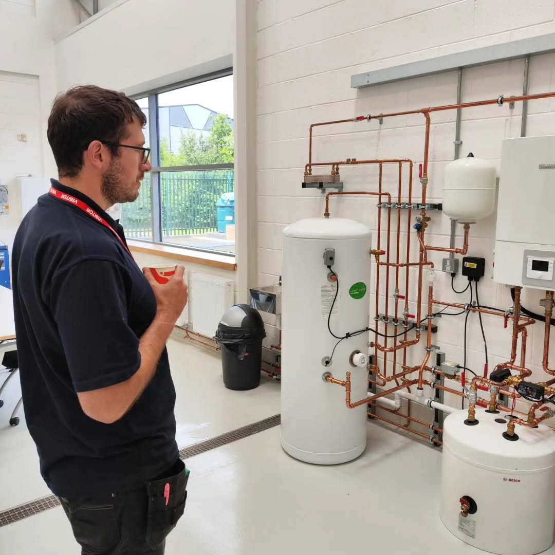 Bumfords engineer working on a Worcester Bosch boiler installation