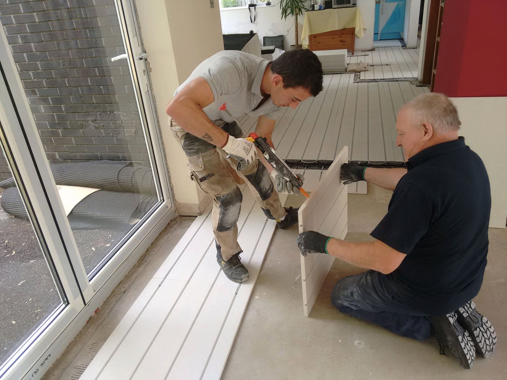 Wet underfloor-heating installation by Bumfords